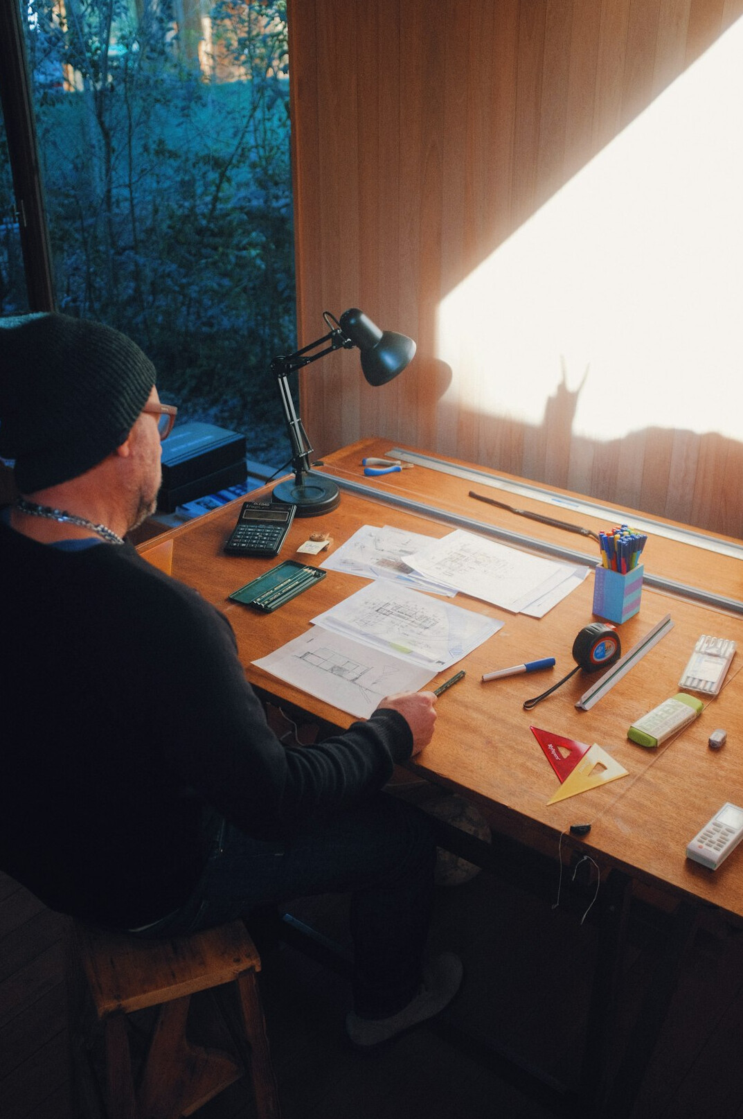author writing at desk