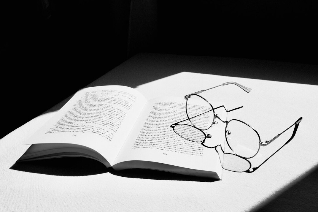 detective reading book pages